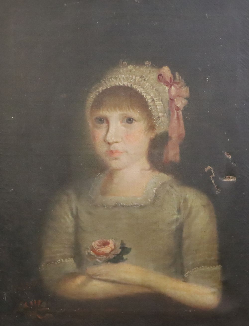 Early 19th century Continental School, possibly American Portrait of a girl holding a rose 24 x 19in.